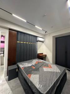 Ένα ή περισσότερα κρεβάτια σε δωμάτιο στο U-Tower - 275