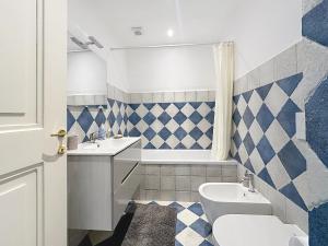 a bathroom with a sink and a toilet at Casa Belvedere di Bolgheri in Bolgheri +27 photos