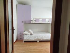 Rúm í herbergi á Corte Cacciatori