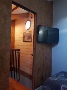 Łóżko lub łóżka w pokoju w obiekcie spacieuse maison de ville avec espace détente