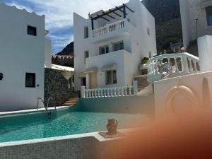 The swimming pool at or close to Entire Villa full View 3 bedrooms 3 bathrooms 3 kitchens