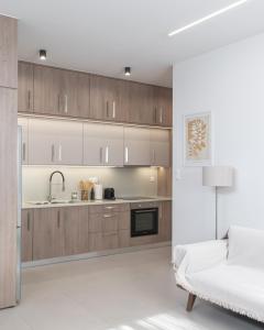 Η κουζίνα ή μικρή κουζίνα στο Harmony Luxury 3
