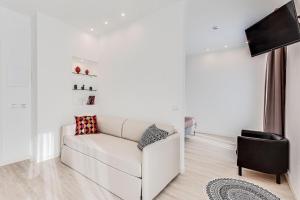 TV a/nebo společenská místnost v ubytování Hotel Anversa + 13 fotografií