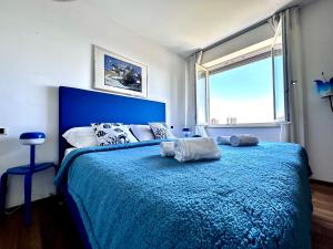 Ένα ή περισσότερα κρεβάτια σε δωμάτιο στο Penthouse Bellavista +72 φωτογραφίες