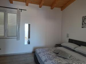 Postel nebo postele na pokoji v ubytování Da Orazio