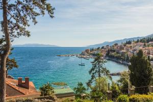 a view of a city and a body of water at Apartments Villa Dinka in Opatija