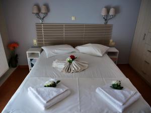 Posteľ alebo postele v izbe v ubytovaní Cosy Apartments Daphne