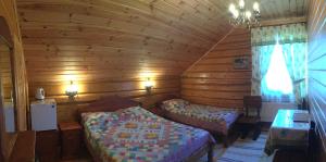 Un ou plusieurs lits dans un hébergement de l'établissement Guest House Na Bamburikhe