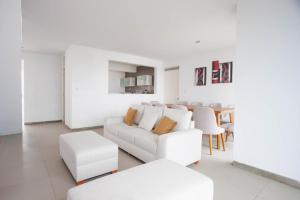 Posezení v ubytování Dúplex con Acceso al VPX Hotel