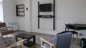 TV a/nebo společenská místnost v ubytování Loft del Valle