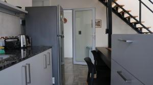 Kuchyň nebo kuchyňský kout v ubytování Loft del Valle