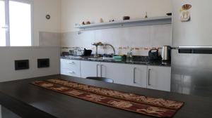 Kuchyň nebo kuchyňský kout v ubytování Loft del Valle