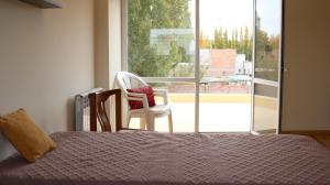 Postel nebo postele na pokoji v ubytování Loft del Valle