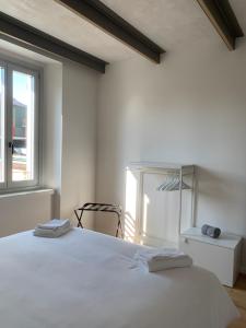Spazio Perlasca Apt 3 - Cernobbio Como Lake客房内的一张或多张床位