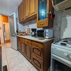 Kuchyň nebo kuchyňský kout v ubytování La Bianca la mare