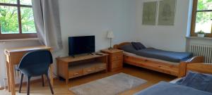 Posezení v ubytování Goldsteig 2 -Zweibettzimmer