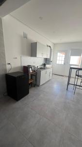 Η κουζίνα ή μικρή κουζίνα στο Duplex trelew
