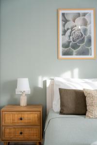 A bed or beds in a room at Villa Giota Luxury Living