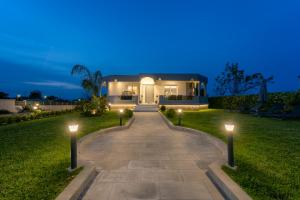 A garden outside Villa Giota Luxury Living