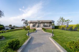 A garden outside Villa Giota Luxury Living