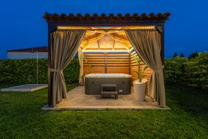 A garden outside Villa Giota Luxury Living