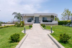 A garden outside Villa Giota Luxury Living