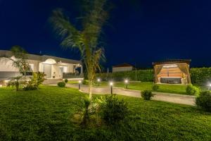 A garden outside Villa Giota Luxury Living