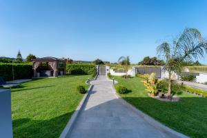 A garden outside Villa Giota Luxury Living