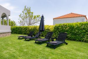 A garden outside Villa Giota Luxury Living