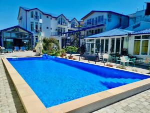 Bazén v ubytování Laguna Beach Club Bazaleti Lake nebo v jeho okolí
