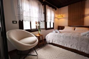 Postel nebo postele na pokoji v ubytování Ador Boutique Hotel