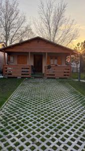 a house with a large driveway in front of it at Gárdonyi nyaraló 1 in Gárdony