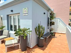 Ein Balkon oder eine Terrasse in der Unterkunft La Casita del Arco Ático