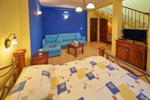 TV a/nebo společenská místnost v ubytování Hotel Laguna