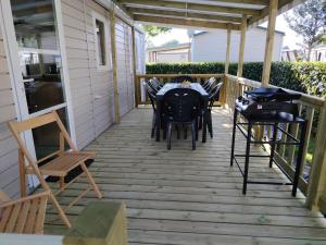 Fotografie z fotogalerie ubytování Mobilhome La Réserve - 3 ch - 6 pers - Terrasse v destinaci Gastes + 6 fotografií