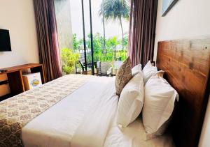 Postel nebo postele na pokoji v ubytování Diyakawa Boutique Hotel + 37 fotografií