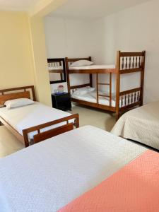 Una cama o camas en una habitación de Hotel Rosandy Galaxy 15 fotos más