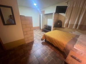 Ένα ή περισσότερα κρεβάτια σε δωμάτιο στο El Agave +15 φωτογραφίες