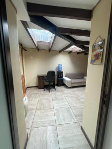 Posezení v ubytování Loft en Quintero