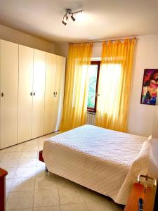 Postel nebo postele na pokoji v ubytování Alla Casa del Nespolo