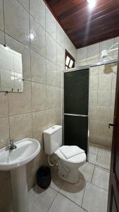 a bathroom with a toilet and a sink at Pousada Casa do Mar Inn Paraty "NOVIDADE" in Paraty +55 photos