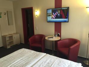 TV a/nebo společenská místnost v ubytování Panorama Hotel Bansin