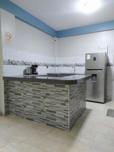 Kuchyň nebo kuchyňský kout v ubytování Hospedaje Kava + 24 fotografií