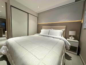Llit o llits en una habitació de ABIBA Apart-Hotel & SPA