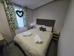 Ένα ή περισσότερα κρεβάτια σε δωμάτιο στο Baywood View Lodge