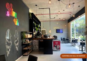 TV a/nebo společenská místnost v ubytování Loft luxuoso na Serra - Granja Brasil Resort Itaipava