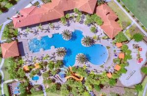 an overhead view of a resort with a swimming pool at Elegant King Suite Rooms -Private Bath-5 Star Resort-Pool-SPA-Club-Disney-Water Park-WiFi-Smart TV in Davenport