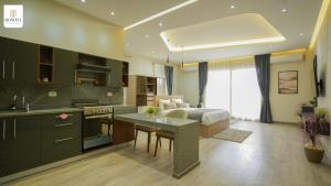 Kuchyň nebo kuchyňský kout v ubytování Homtel Residence West Golf - Kattamya