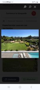 a screenshot of a website with a picture of a pool at Casa Santo Domingo in San Antonio +12 photos