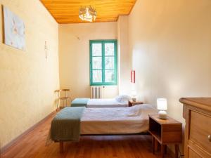 Katil atau katil-katil dalam bilik di Spacious Home with Beach Access